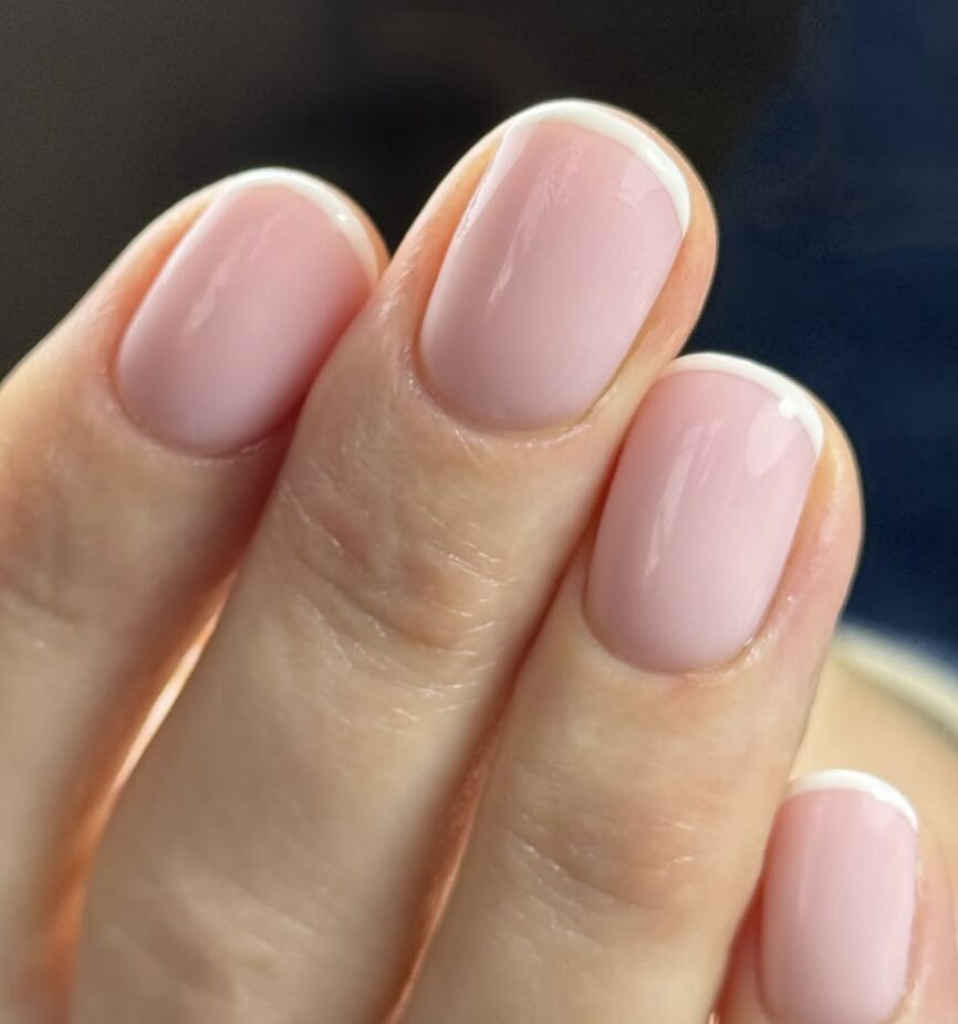 Classic French manicure close-up
